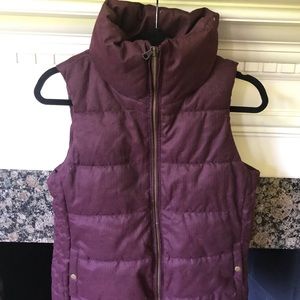 Maroon and white vests